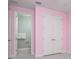Bedroom features a double door closet and doorway to the ensuite bathroom at 113 Azure Mist Way, Daytona Beach, FL 32124