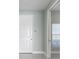 Light and airy entryway with white door, neutral walls, and tile flooring at 113 Azure Mist Way, Daytona Beach, FL 32124