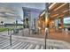 Outdoor patio area featuring tables and chairs perfect for relaxing and dining al fresco at 113 Azure Mist Way, Daytona Beach, FL 32124