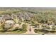 Expansive aerial view of the community with winding roads, lush landscaping, and ample parking at 11901 Sandy Knoll Ct # 814, Orlando, FL 32825