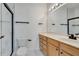 Bathroom featuring light wood vanity, modern sink, and tiled enclosed shower with a modern design at 11901 Sandy Knoll Ct # 814, Orlando, FL 32825