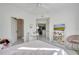 Spacious bedroom with white marble floors, and connecting bathroom and kitchen at 11901 Sandy Knoll Ct # 814, Orlando, FL 32825