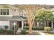 Inviting townhome with well-maintained landscaping, a brick facade, and convenient parking at 11901 Sandy Knoll Ct # 814, Orlando, FL 32825