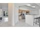 Open kitchen with stainless appliances, breakfast bar and marble floors at 11901 Sandy Knoll Ct # 814, Orlando, FL 32825