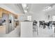 Bright kitchen with stainless steel appliances, light wood cabinets, and kitchen island with seating at 11901 Sandy Knoll Ct # 814, Orlando, FL 32825