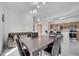 Bright living room with an open floor plan, seamlessly connecting the living, dining, and kitchen areas at 11901 Sandy Knoll Ct # 814, Orlando, FL 32825