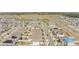 Expansive aerial view showcases a vibrant residential community with well-maintained streets and lush green spaces at 1260 Tupelo Trl, Haines City, FL 33844