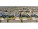 Aerial view of a community featuring perfectly aligned homes and manicured lawns at 1260 Tupelo Trl, Haines City, FL 33844