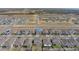 Discover an aerial perspective of a suburban neighborhood, featuring cozy homes and picturesque streetscapes at 1260 Tupelo Trl, Haines City, FL 33844