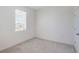 Bedroom with carpet, window and a door at 1260 Tupelo Trl, Haines City, FL 33844