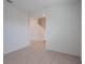 A large living area with an open view of the staircase at 1260 Tupelo Trl, Haines City, FL 33844
