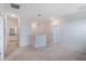 Loft area featuring an open view, neutral walls, and carpeted floors at 1260 Tupelo Trl, Haines City, FL 33844
