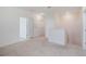 Bright and open carpeted loft area, perfect for a playroom or home office at 1260 Tupelo Trl, Haines City, FL 33844
