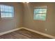 This bedroom features lots of natural light and neutral walls at 1315 Carlsbad Pl, Orlando, FL 32808