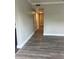 Hallway with wood floors and white trim at 1315 Carlsbad Pl, Orlando, FL 32808