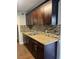 Updated kitchen with stainless steel appliances and mosaic backsplash at 1315 Carlsbad Pl, Orlando, FL 32808