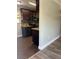 Kitchen featuring dark wood cabinets and tile backsplash at 1315 Carlsbad Pl, Orlando, FL 32808