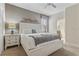 Comfortable bedroom featuring a queen bed, decorative wall art, and a ceiling fan at 1494 Moon Valley Dr, Davenport, FL 33896