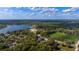 Majestic estate overlooking a tranquil lake and well-maintained sports fields at 1501 Lake Markham Rd, Sanford, FL 32771
