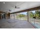 Spacious covered patio with pool views, ceiling fans, and ample outdoor space at 1501 Lake Markham Rd, Sanford, FL 32771