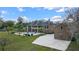 Expansive brick home featuring a pristine pool, lush landscaping, and ample parking at 1501 Lake Markham Rd, Sanford, FL 32771
