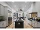 Spacious kitchen with modern appliances, large center island, custom cabinets, and adjacent breakfast nook at 1501 Lake Markham Rd, Sanford, FL 32771
