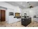 Gourmet kitchen features stainless steel appliances, custom cabinetry, granite countertops, and decorative tile backsplash at 1501 Lake Markham Rd, Sanford, FL 32771