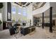 Open concept living area with fireplace, high ceilings, and direct access to outdoor pool at 1501 Lake Markham Rd, Sanford, FL 32771