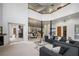 Large living room with fireplace, pillars, access to multiple rooms, and neutral decor at 1501 Lake Markham Rd, Sanford, FL 32771
