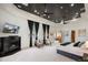 Main bedroom with fireplace, black ceiling, and neutral decor at 1501 Lake Markham Rd, Sanford, FL 32771