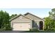 Charming single Gathering home features an attached two car garage, neutral color palette, and manicured lawn at 1831 Waggoner St, Kissimmee, FL 34744