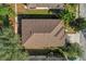 Aerial view of the home showcases its layout, roof design, and surrounding landscape at 1843 Van Allen Loop, Auburndale, FL 33823