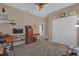 Bedroom with neutral paint, closet, desk, and a ceiling fan for added comfort at 1843 Van Allen Loop, Auburndale, FL 33823