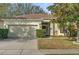 Charming single-story home with a well-maintained lawn and an attached two-car garage at 1843 Van Allen Loop, Auburndale, FL 33823