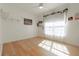 Bedroom with light hardwood floors, white walls, and a ceiling fan at 1910 Lake Roberts Landing Dr, Winter Garden, FL 34787
