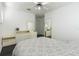Bright bedroom with a large bed, hardwood flooring, and ample storage at 1910 Lake Roberts Landing Dr, Winter Garden, FL 34787