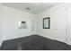 Bright bedroom with dark hardwood floors, white walls, and recessed lighting at 1910 Lake Roberts Landing Dr, Winter Garden, FL 34787