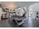 Expansive game room featuring a pool table, stylish bar, and staircase to the upper level at 1910 Lake Roberts Landing Dr, Winter Garden, FL 34787