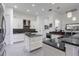Stylish kitchen with granite countertops, island and ample cabinet space at 1910 Lake Roberts Landing Dr, Winter Garden, FL 34787