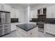 Modern kitchen featuring stainless steel appliances and white cabinets at 1910 Lake Roberts Landing Dr, Winter Garden, FL 34787