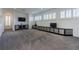 Loft featuring gray carpet, modern media center, and natural light at 1910 Lake Roberts Landing Dr, Winter Garden, FL 34787