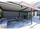 Outdoor covered seating area for relaxation and entertaining at 1910 Lake Roberts Landing Dr, Winter Garden, FL 34787