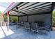 Outdoor covered seating area for relaxation and entertaining at 1910 Lake Roberts Landing Dr, Winter Garden, FL 34787