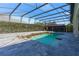 Inviting screened-in pool area with tile decking and spacious outdoor living for relaxation and entertaining at 1910 Lake Roberts Landing Dr, Winter Garden, FL 34787