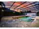 Picturesque pool area featuring a spa and spacious patio, illuminated at twilight at 1910 Lake Roberts Landing Dr, Winter Garden, FL 34787