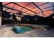 Stunning pool area at dusk with a serene atmosphere and elegant lighting at 1910 Lake Roberts Landing Dr, Winter Garden, FL 34787
