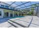 Inviting screened-in pool area with tile decking and spacious outdoor living for relaxation and entertaining at 1910 Lake Roberts Landing Dr, Winter Garden, FL 34787
