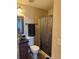 Bathroom featuring modern fixtures and finishes, including a sleek vanity sink and tiled floors at 1997 Dixie Belle Dr # 1997C, Orlando, FL 32812