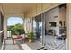 Outdoor balcony area with lake view and access to the living room at 200 Maitland Ave # 96, Altamonte Springs, FL 32701