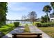 Breathtaking lake view from the path, surrounded by trees and lush foliage at 200 Maitland Ave # 96, Altamonte Springs, FL 32701